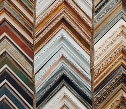 A group of different colored frames stacked on top of each other.